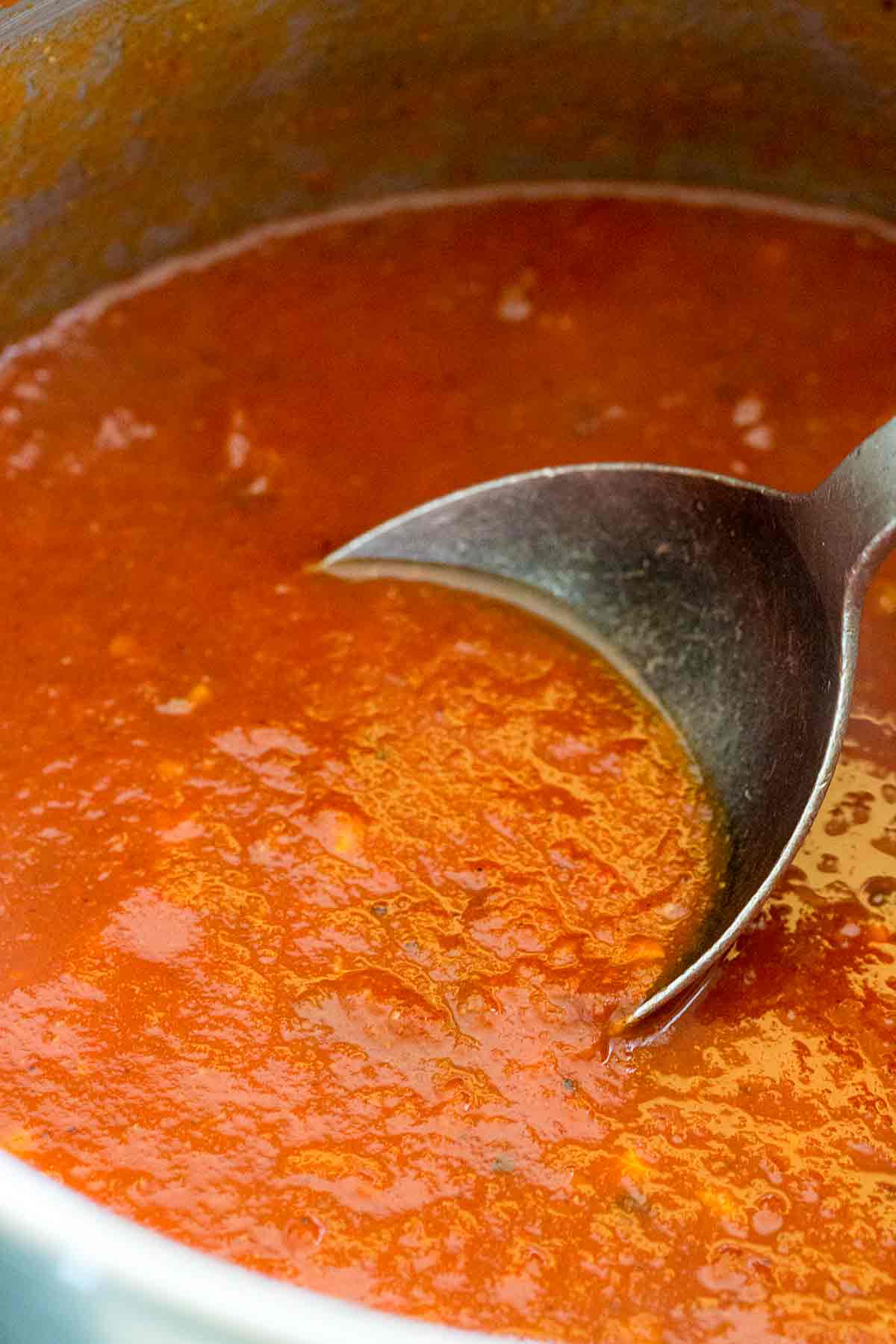 勺子混合煨碗enchilada调味汁