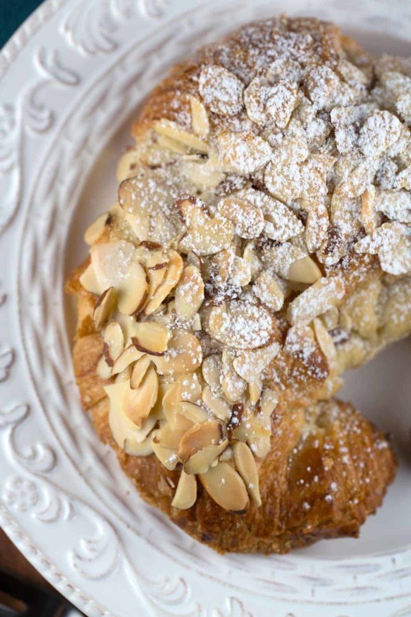 top down view of a plate with an almond croissant