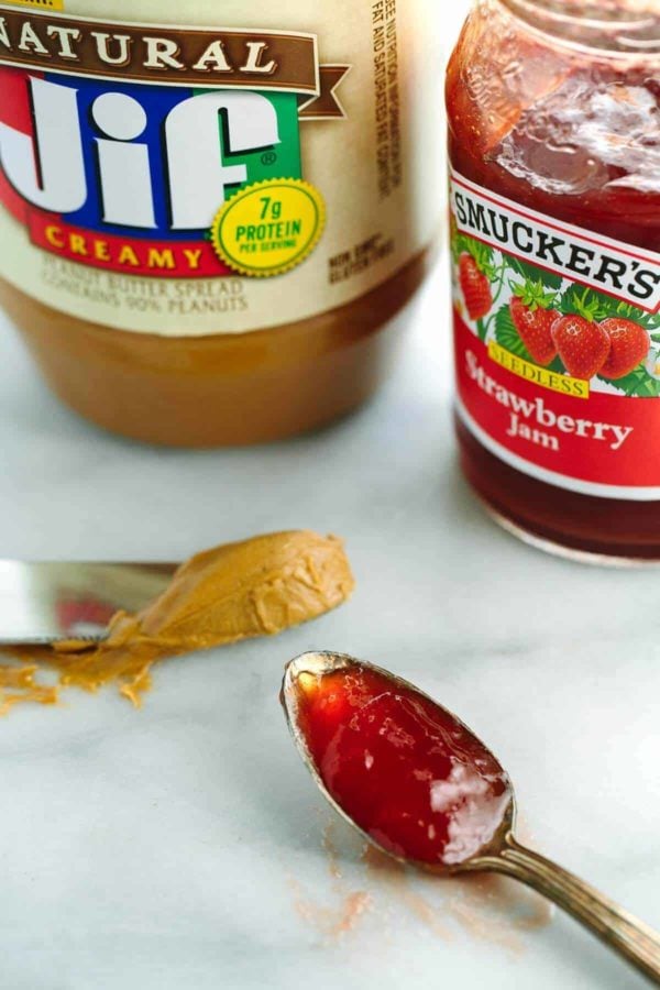 Jif natural creamy peanut butter and Smucker's strawberry jam