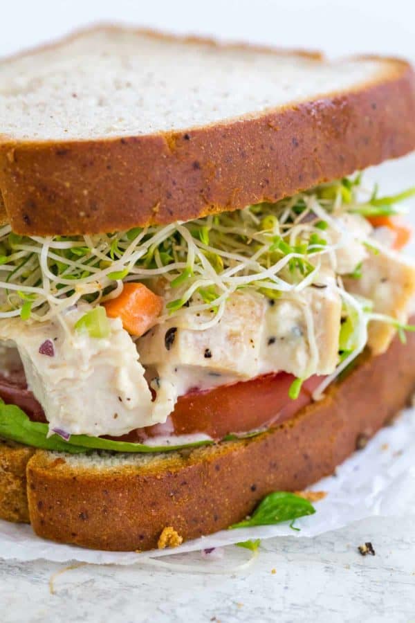 Closeup of a chicken salad sandwich with gluten free bread